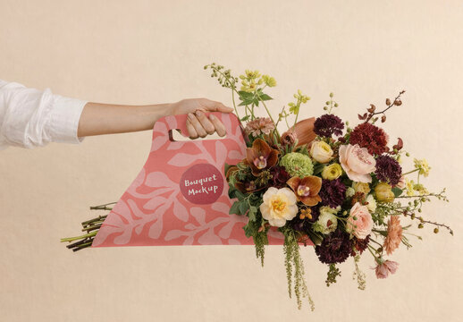 Female Hand Holding Floral Bouquet Mockup PSD With Colorful Blooms