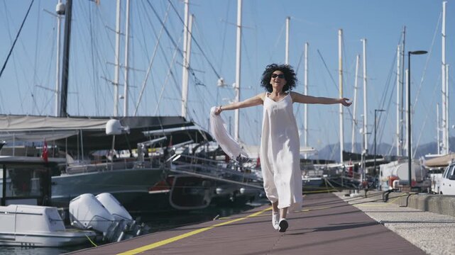 Happy Woman Running on Pier in Marmaris Turkey