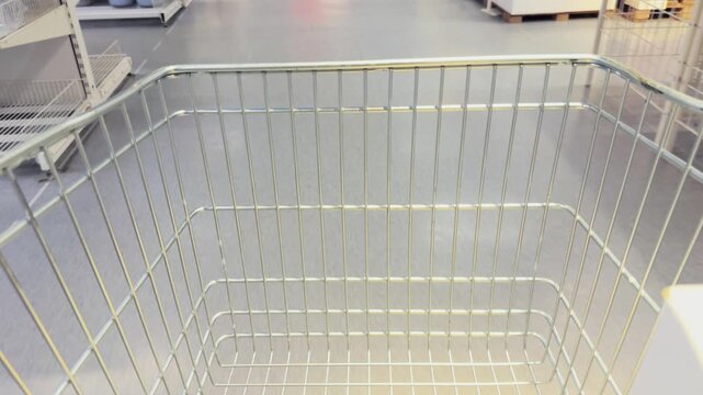 Shopper Perspective Empty Cart Moving Through Retail Store