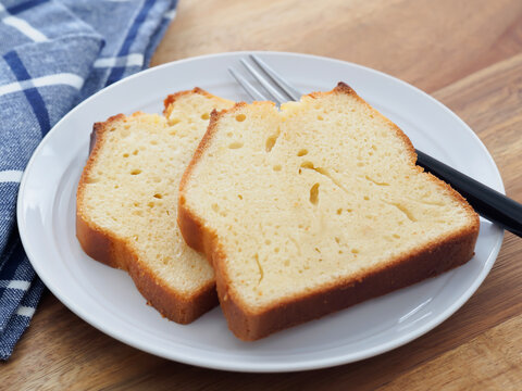 Sliced Pound Cake on White Plate, Close-up Texture