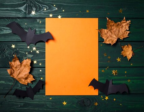 Spooky Party Invitation Concept With orange paper and decor