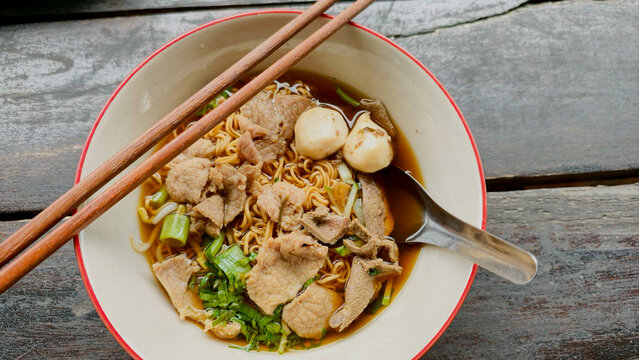 noodle with pork soup in bowl. Thai traditional food