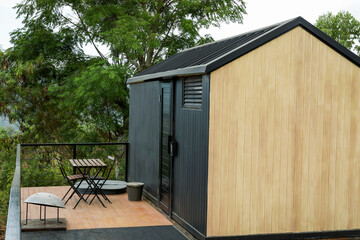 Fototapeta premium Cozy cabin in greenery for a peaceful getaway