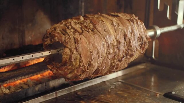 Traditional Doner Kebab Meat Roasting on a Vertical Spit