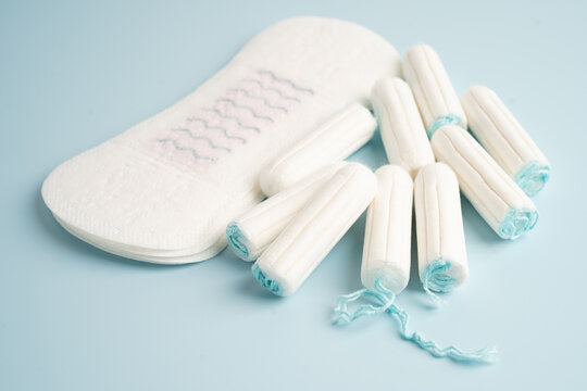 Menstruation cycle with sanitary cotton tampon for woman hygiene and protection.