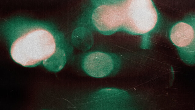 light leak overlay effect with scratch dust and blur light leaks, retro grain noisy film distressed texture light leak flare on black background, grunge background with rays of light 