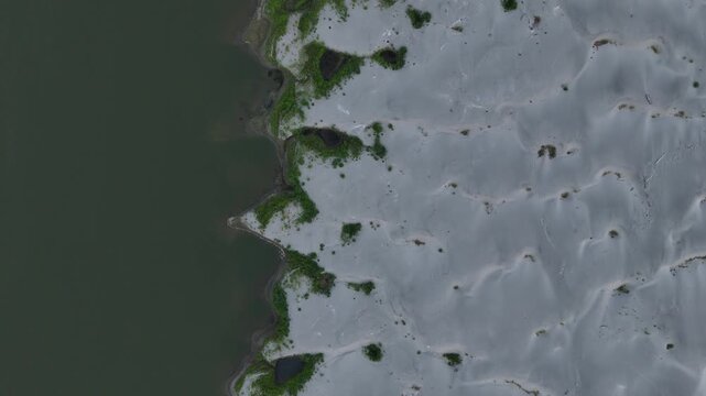 Po River near Isola Serafini, Monticelli d'Ongina, Piacenza, Emilia-Romagna, Italy, revealing exposed alluvial sandbars, channel contraction, reduced wetted area and severe drought conditions during t