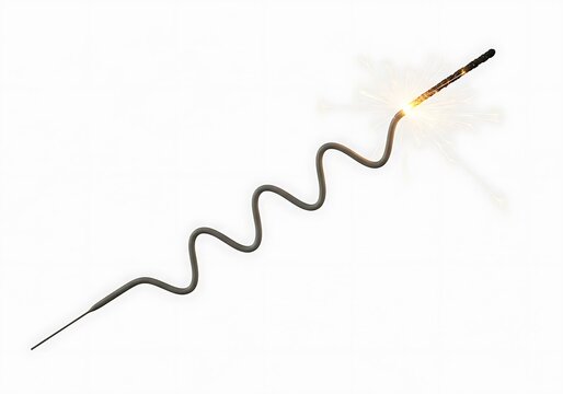 Burning wavy sparkler firework emitting golden sparks