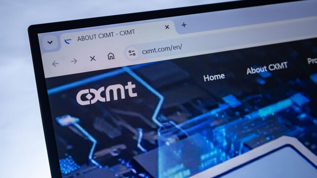 Changxin Storage CXMT official website on laptop screen features semiconductor memory chip technology and circuit design graphics.