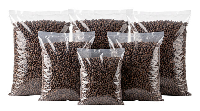 Industrial plastic bags filled with brown pellets, bulk supply of animal feed or fertilizer in clear packaging, wholesale granules isolated PNG with Transparent Background