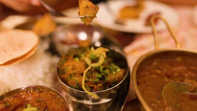Indian Cuisine Aloo Gobi Curry Served in Silver Bowl