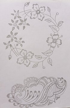 Hand drawn floral wreath and henna pattern sketch