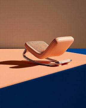 Peach colored ergonomic rocking chair with ribbed seat on a split blue and peach