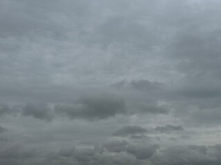 Obraz premium Stormy Weather Clouds Background Featuring Dark Layered Cloud Formations, Dramatic Atmospheric Tones and Moody Severe Weather Conditions