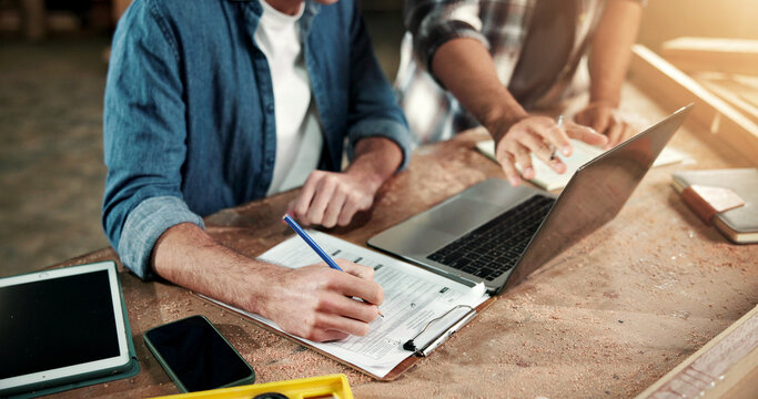 Hands, carpenter and laptop at factory with clipboard, research and pricing timber for production. People, checklist and pc at workshop for carpentry, quotation and team for manufacturing furniture