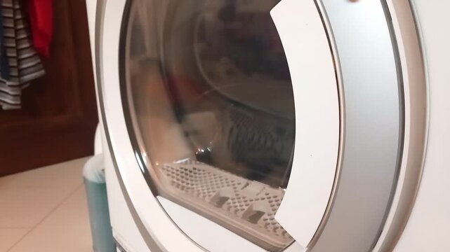 Electric Dryer Door Heavy Slam with Metallic Latch Clunk -- Close-up on Door Sealing Shut