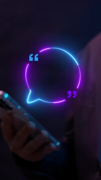 Businessman holding smartphone vertical shot displaying glowing circular quote speech bubble frame overlay display. Customer testimonial feedback, communication quote, and dialog comment concept.