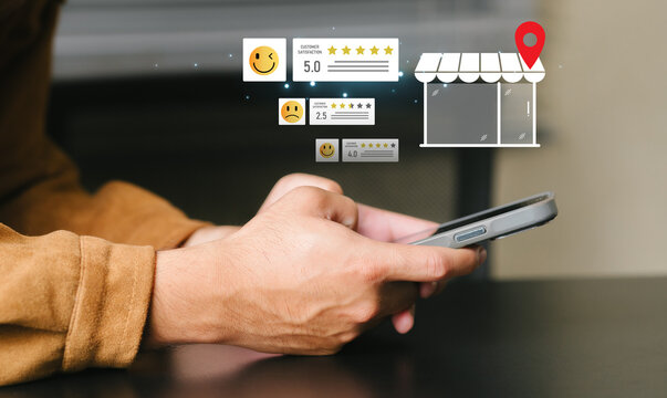 Person using smartphone for online restaurant review and local business rating