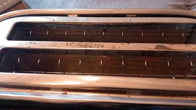 Captivating sounds of a kitchen, featuring a toaster in action during its heating cycle