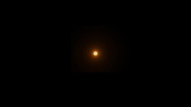 Abstract warm lens flare glowing point animation isolated on black background