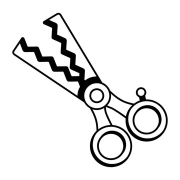 A pair of red and blue serrated pet grooming shears.