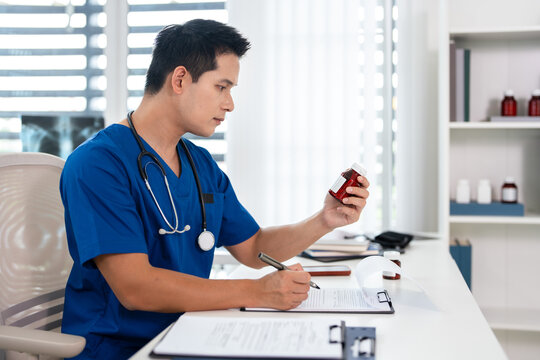Young male physician prescribing pills and supplements to patient