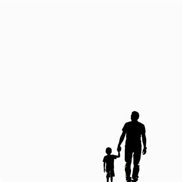 Silhouette of father and son walking