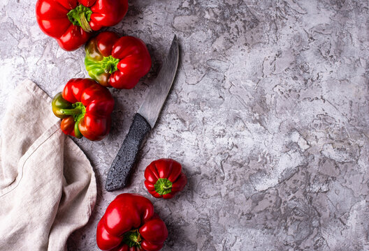 Fresh ripe sweet bell pepper on grey background