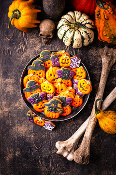 Halloween cookies in shape of pumpkin jack-o-lantern