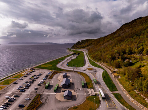 Aerial view of the Ryfast Tunnel entrance and surrounding infrastructure, including a roundabout, parking area, and coastal road in Solbakk, Rogaland, Norway.