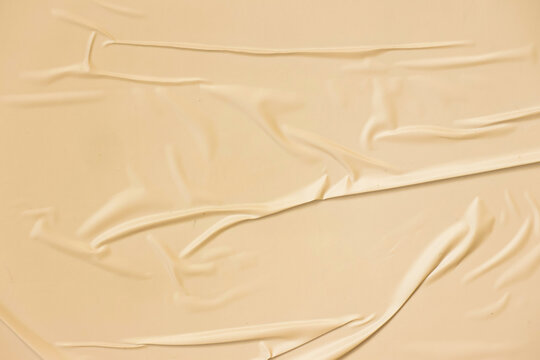 Yellow blank crumpled and creased paper poster texture background
