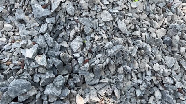 Crushed gravel stones material at construction site