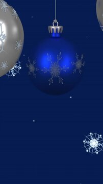 Animation of christmas baubles over snowflakes on blue background