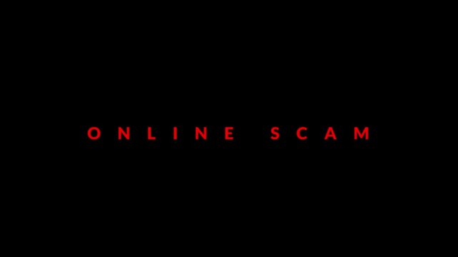 Online scam alert message shines in vivid red text against a dark background.