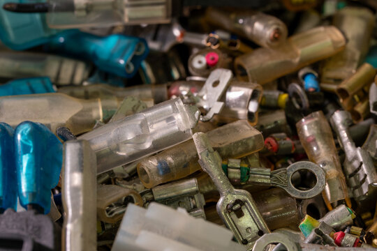 brass electrical terminal connector cut from electrical wiring and sorted for scrap and ready for recycling.