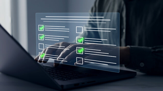 Businessman in computer doing online data documentation checklist survey. Fast checklist,clipboard task business management.Productivity checklist and filling survey form online.	
