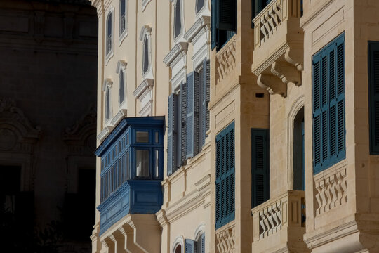 Valletta traditional enclosed balcony architecture and limestone building