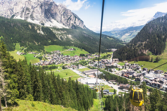 Cable car above a mountain village in the Italian Dolomites