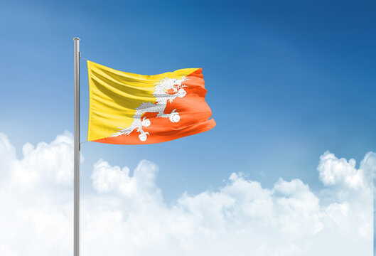 Bhutan flag waving in beautiful sky.