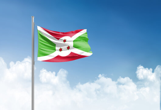 Burundi flag waving in beautiful sky.