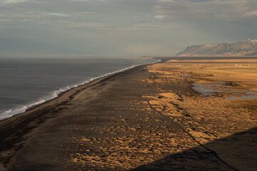 Aerial View of Endless Black Sand Coastline in Southern Iceland © ANGEL LARA FOTO