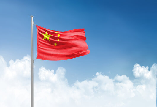 China flag waving in beautiful sky.