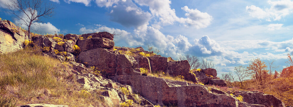 Mountain landscape on a sunny day, granite slope hill