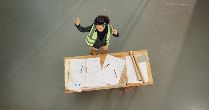Dance, architecture and blueprint with above of woman for sketching success, engineer and music. Streaming, floor pan and energy with person and headphones for construction site, renovation and space