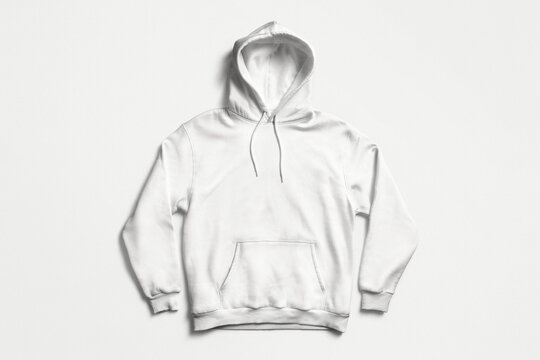 Blank white pullover hoodie mockup on light background, front view with hood and drawstrings. Minimal apparel flat lay for fashion branding and print design