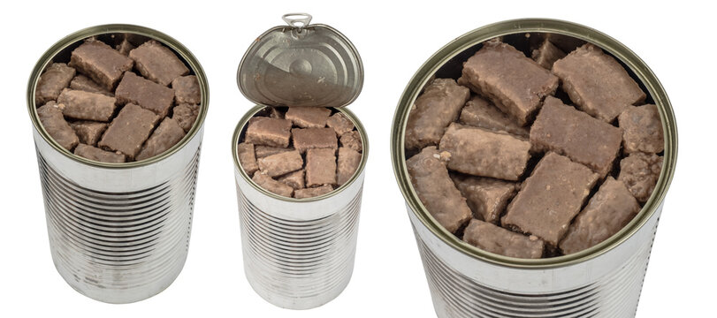 A collection set of open metal cans filled with chunked wet dog food chunks, viewed from different angles showing textured meat pieces, isolated on a transparent background.