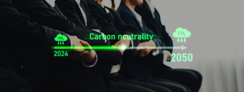 A sleek timeline showcasing the journey toward carbon neutrality from 2024 to 2050, featuring business professionals in suits engaged in discussing environmental strategies and goals. Trope