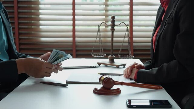 Honest lawyer rejecting bribery money in office