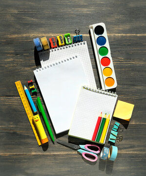 set of accessories, school stationery and notebooks on wooden table. Back to school, education, Knowledge Day, 1 september, creativity, artistic art concept. top view. copy space. template for design