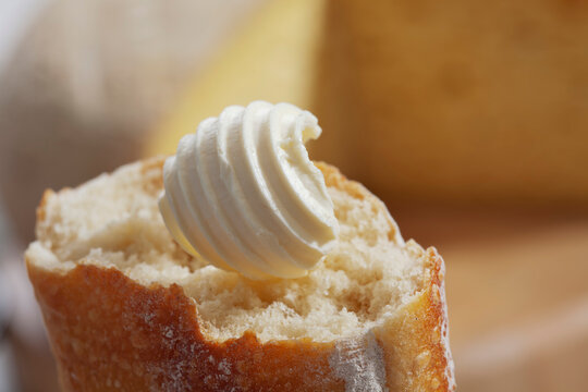 Curl of butter on baguette